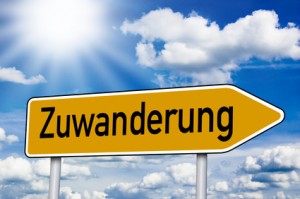 Wegweiser mit Zuwanderung